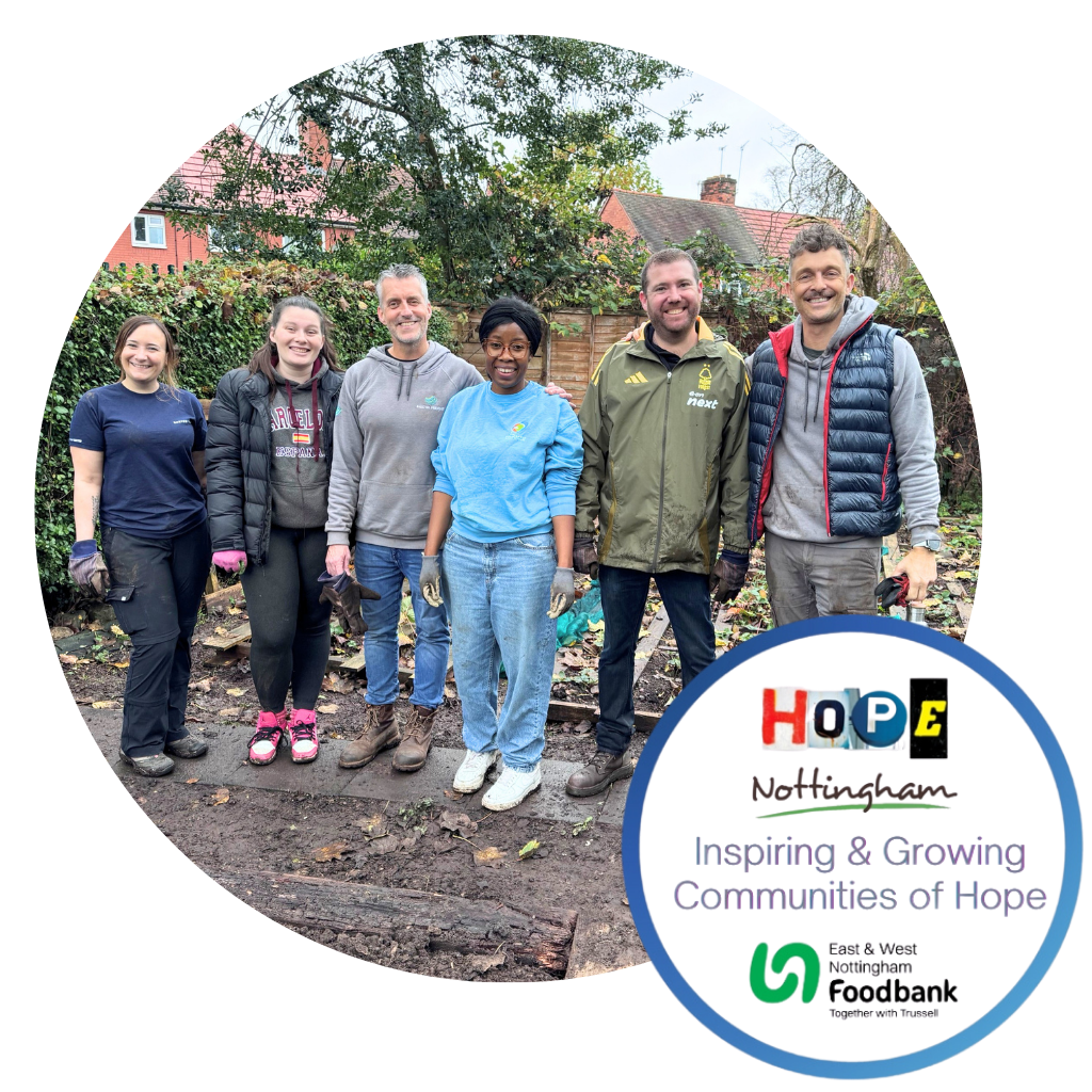 A group photo of the team volunteering for Hope Nottingham, accompanied by the Hope Nottingham logo