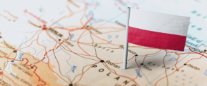 Polish flag pin on the map of poland